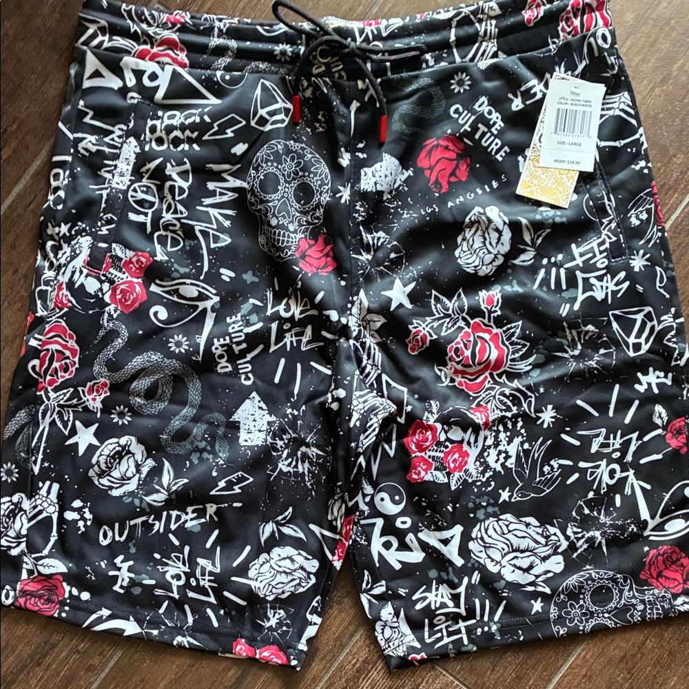 Men's Black and Red Graphic board shorts.